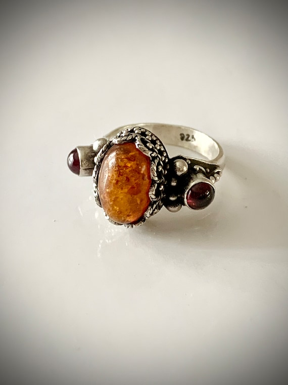 Vintage Baltic Amber and garnet ornate ring