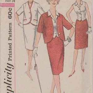 May include: Vintage Simplicity sewing pattern featuring three women's suit designs. The pattern includes a red skirt suit with a matching jacket, a white skirt suit with a contrasting trim, and a sleeveless top and skirt ensemble. The pattern number is 3393.