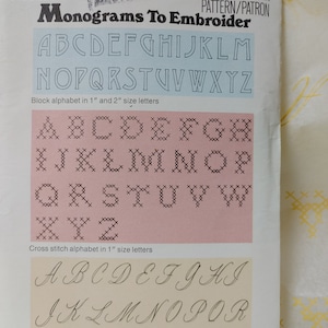 May include: A vintage embroidery pattern booklet with the title "Monograms To Embroider". The booklet features a block alphabet, cross stitch alphabet, and script alphabet in 1" and 2" sizes.