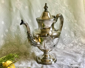 Antique silver plate chased and repousse coffee pot by Wm Rogers #1211