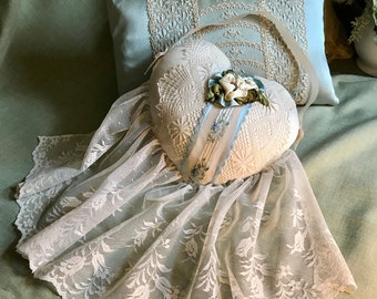 Hanging heart pillow gift for your valentine.  Ribbon work flowers and a flounce of lace