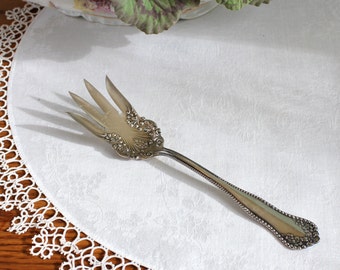 Antique silver plate lettuce fork from the Edwardian era.  Rogers AA silver plate Mayflower pattern 1901