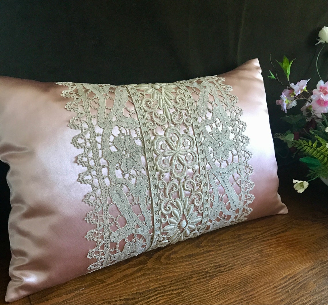 Antique lace pillow in silk boudoir shape. Heavily textured Etsy