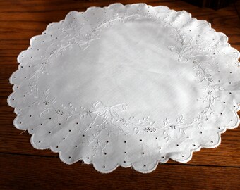 Embroidered linen table centerpiece.