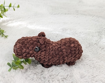 かぎ針編みのカピバラぬいぐるみ：ヘッドフォンとアイスクリーム付きの