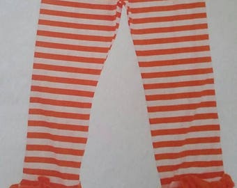 orange and white striped pants