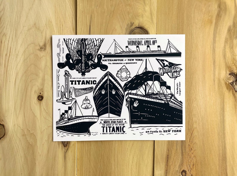 May include: A black and white illustration of the RMS Titanic, the "Queen of the Ocean", with the text "White Star Fleet" and "Titanic" on the image. The image also includes a lifeboat, an anchor, a bell, and a ship's wheel.