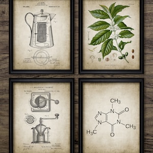 May include: Four framed vintage-style prints with black frames. The prints feature coffee-related illustrations: a coffee maker diagram, a botanical illustration of coffee plant, a coffee grinder diagram, and a caffeine molecule diagram.