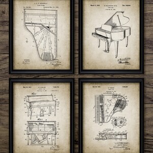 May include: A set of four vintage piano patent prints. Each print features a black and white illustration of a piano design with text detailing the patent information. The prints are framed in black frames and have a vintage, aged paper background.