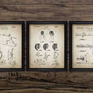 May include: Set of three framed patent prints featuring fencing equipment and techniques. The black and white illustrations are on aged paper, with dates and diagrams. The frames are black, and the background is a wood grain.