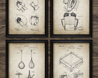 May include: Four vintage boxing patent drawings. The first shows a pair of boxing gloves, the second shows a boxing helmet, the third shows a punching bag, and the fourth shows a boxing ring.