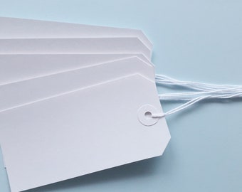 25 white paper strung gift/pricing tags, size 120mm x 60mm blank labels with white string