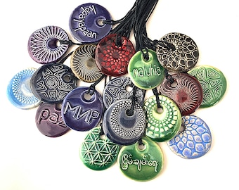 Ceramic Pendants with Peace in many Languages!
