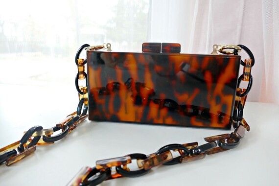 tortoise acrylic clutch