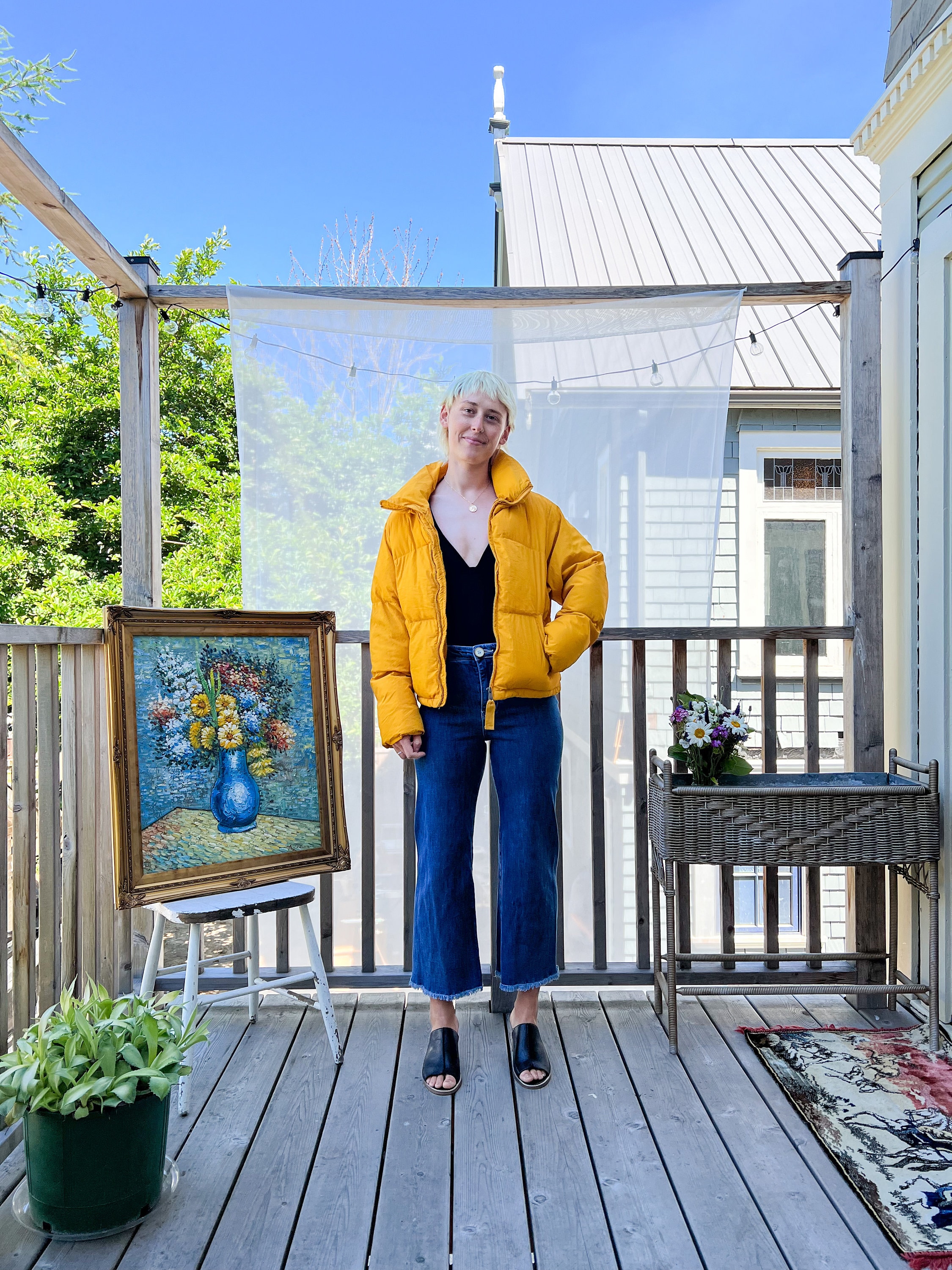 Bright yellow puffer coat top