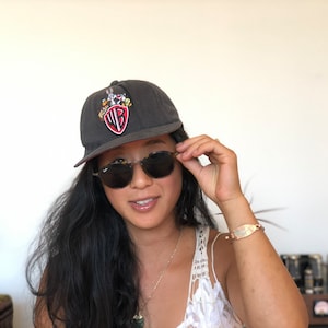 Vintage 90s Warner Bros. Black Singapore Souvenir Cotton Baseball Hat
