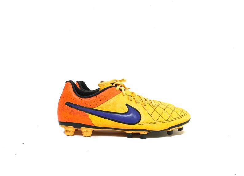 orange and blue football cleats
