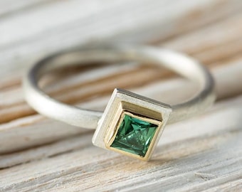 handmade ring in silver, gold bezel, set with green tourmaline