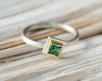 handmade ring in silver, gold bezel, set with green tourmaline