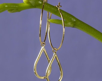 Delicate hoop earrings in 585 gold with added teardrop. Handcrafted in solid gold - and fine gold, fine genuine handcrafted jewelry.