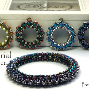 May include: Four beaded jewelry pieces in a variety of colors, including green, blue, and purple. The pieces are arranged in a row on a white surface. The text "Tutorial engl./dt." is visible below the jewelry.