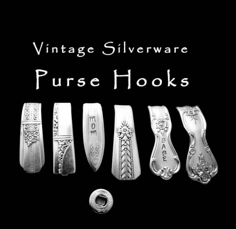 May include: Six vintage silverware purse hooks with different designs. The hooks are made of silver and have a polished finish. The hooks are engraved with the words "Mom", "Babe", and other designs.