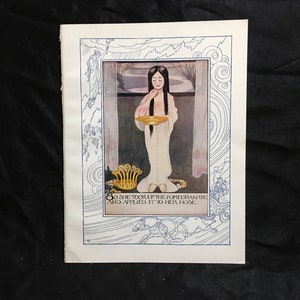 So she took up the Pomegranate and applied it to her nose 1938 Color Art Print Tanglewood Tales Nathaniel Hawthorne