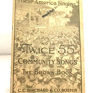 May include: A vintage book cover with a black and white illustration of a large crowd of people. The title is "Twice 55 Community Songs" and the subtitle is "The Brown Book". The book is published by C.C. Birchard & Co. Boston.