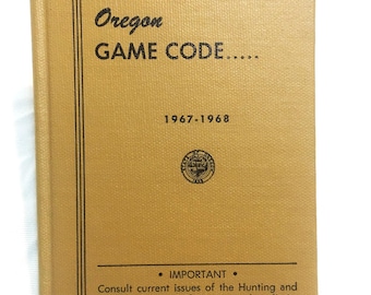 May include: A gold-colored book titled "Oregon GAME CODE....." with the years "1967-1968" printed on the cover. The book has black lines on the spine and a small seal on the front cover. The text "IMPORTANT" is printed in black on the bottom of the cover, along with instructions to consult current issues of the Hunting and Angling Synopses for seasons, bag limits, and closed areas.