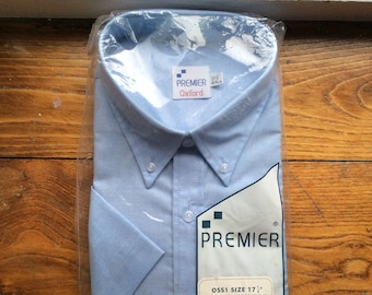 Vintage 17 1/2 collar Deadstock short sleeved blue shirt, chest 55” New old stock in pack.