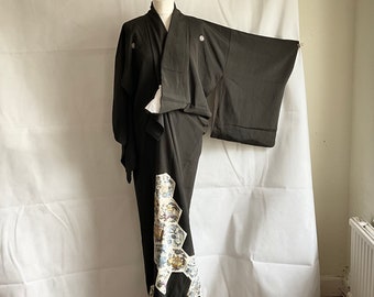 Vintage Japanese black  kimono, metallic embroidered border, silk lining.