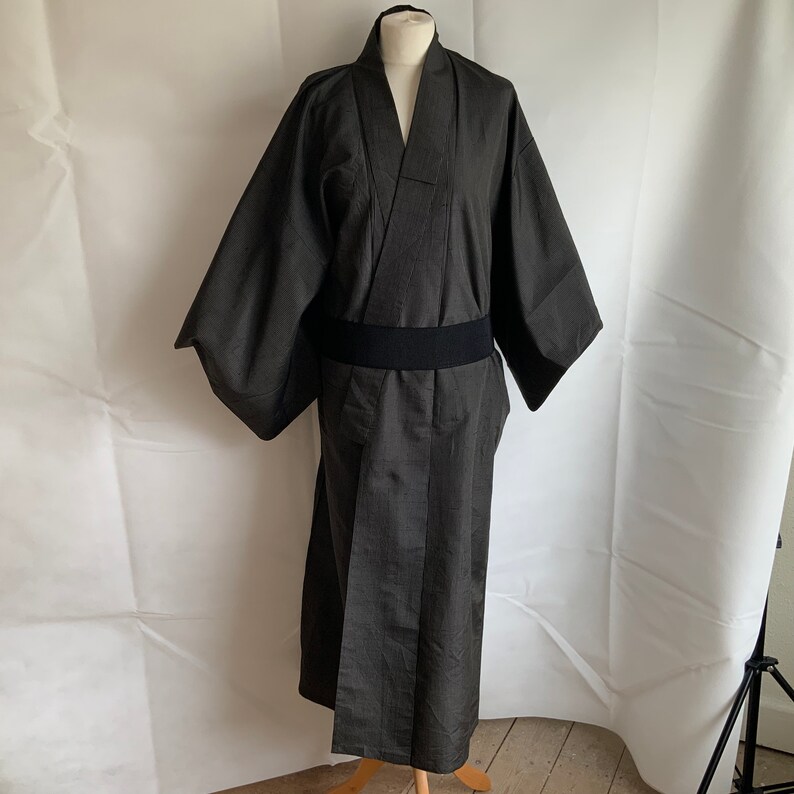 Vintage Japanese mans charcoal pinstripe silk kimono. Fits most. Vintage Japanese mans charcoal pinstripe silk kimono. Fits most.