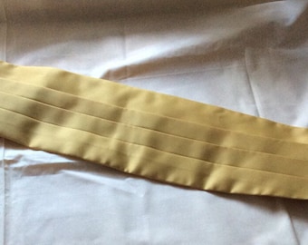 Vintage L cummerbund goud, Moss Bros