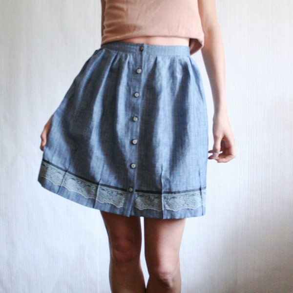 Blue stripped above the knee skirt with button front and lace trim at the hem