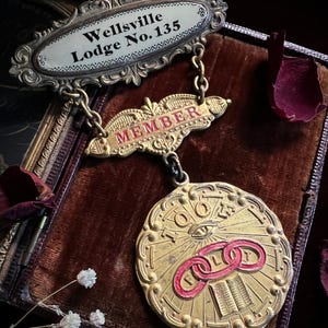 Antique IOOF Wellsville Lodge No. 135 Member Medal | Odd Fellows Fraternal Badge | M.C. Lilley & Co.