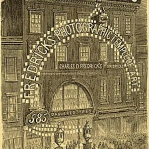 May include: A black and white illustration of a storefront with the text "Fredrick's Photographic Temple of Art" above the entrance. The storefront is located at 585 Broadway and features a large arched window with the text "Daguerreotypes" below it.