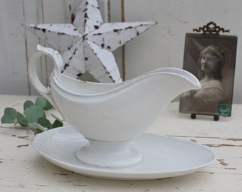 French white ironstone antique gravy boat with serpent head handle by Creil et Montereau