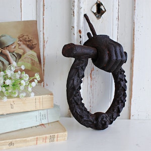 Large French antique door knocker, cast iron door knocker with hand, lion and laurel leaf detail