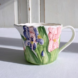 Hand painted bone china creamer or jug with decorative iris flower detail