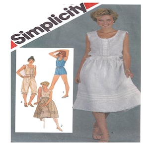 May include: A sewing pattern for a sleeveless dress with a gathered skirt and a lace trim. The pattern includes four different styles, including a short dress, a long dress, a pair of shorts, and a skirt. The pattern is from Simplicity.