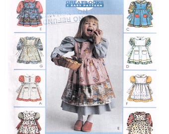 Patron de couture de robe fille 8975 McCalls, tablier, pull, col claudine, bordure en dentelle, volant, manches évasées/courtes, taille enfant 2-3-4