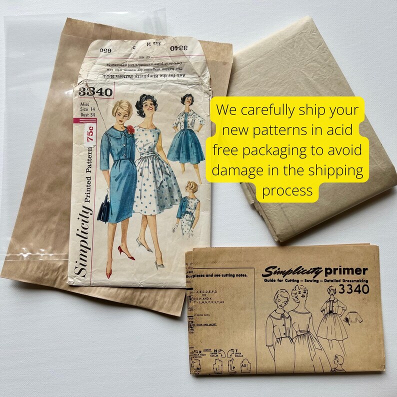 May include: Vintage Simplicity sewing pattern packet, size 14, featuring illustrations of dresses. The packet is accompanied by a primer and is packaged in acid-free packaging. The text on the packet reads "Simplicity Printed Pattern 75c".