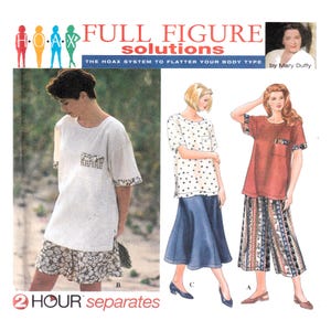 Könnte beinhalten: Ein Set aus drei Keramikbechern mit gesprenkelter, matter Oberfläche. Die Becher sind in Creme-, Hellgrau- und Dunkelgrautönen gehalten. Jeder Becher hat ein schlichtes, minimalistisches Design.