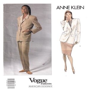 May include: A tan suit with a blazer and matching pants. The blazer has a notched lapel and a single-button closure. The Vogue Patterns logo is visible at the bottom of the image. The Anne Klein logo is also visible.