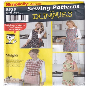 May include: Sewing pattern for aprons, Simplicity pattern number 5525 for sizes S, M, L. The pattern includes three different apron styles: a gingham apron with a red and white pattern, a floral apron with a green and white pattern, and a blue and white floral apron. The pattern is for sewing dummies, and the text "Stitch up a storm the Fun and Easy Way" is included.