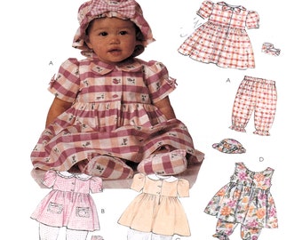 McCalls 6957, jurk in Holly Hobby-stijl voor kleine meisjes, trui, overgooier, muts en pantoffels met rand naaipatroon kind meerdere maten