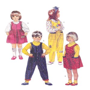 May include: Illustration of children's clothing patterns. The image shows a pink dress, yellow overalls, a blue jumpsuit, and a red polka dot dress. Each outfit is paired with a turtleneck and shoes. The outfits are designed for children.