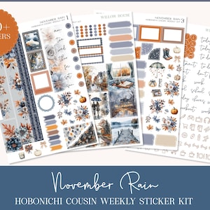 May include: A collection of planner stickers with a fall theme. The stickers feature watercolor illustrations of autumn leaves, pumpkins, and cozy scenes. The kit includes various sticker sheets with the text "November Rain" and "150+ Stickers".