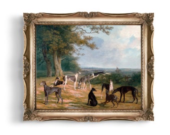 May include: A framed oil painting depicting a group of greyhounds in a grassy field. The dogs are in various poses, some running, some standing, and some lying down. The background features a lush green forest and a distant view of a town.