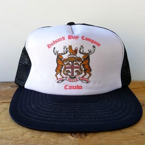 Vintage 80s Hudson&#39;s Bay Company Canada Promo Trucker Hat - Black Mesh Snapback Graphic Logo Baseball Cap - HBC Pro Pelle Cutem Rare Ballcap